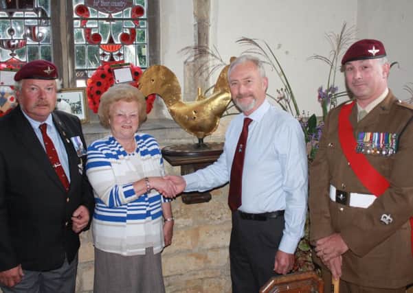 Lord Lieutenant of Leicestershire, Lady Gretton, is welcomed to the Friends of the Tenth group by Chairman Alec Wilson in Somerbys All Saints Church. EMN-170921-150029001
