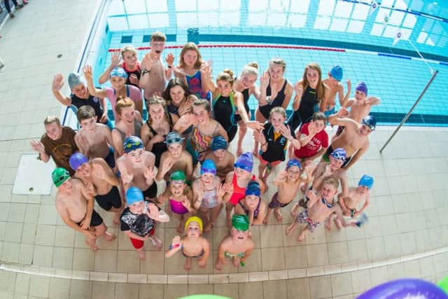 An aerial shot of participants for the Duchenne Dip rundraiser at Melton.
Photo Robert White EMN-170926-125157001