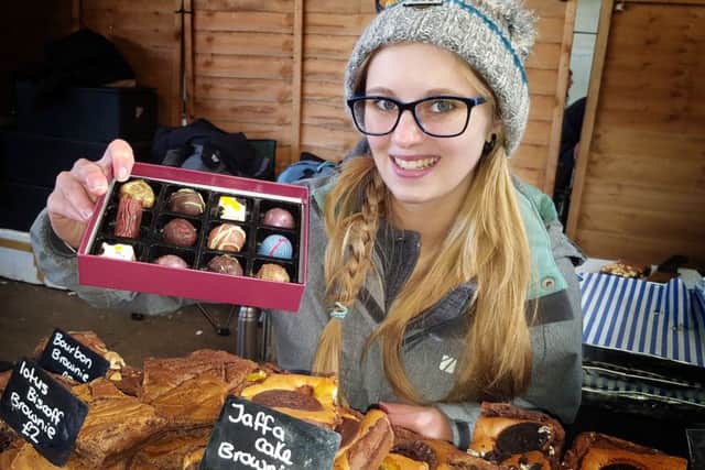 Amy Lewis shows off some goodies from Jack Lewis chocolates PHOTO: Tim Williams
