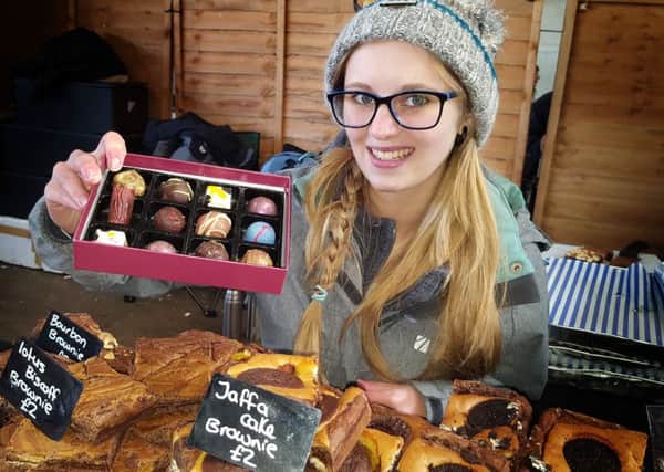Amy Lewis shows off some goodies from Jack Lewis chocolates PHOTO: Tim Williams