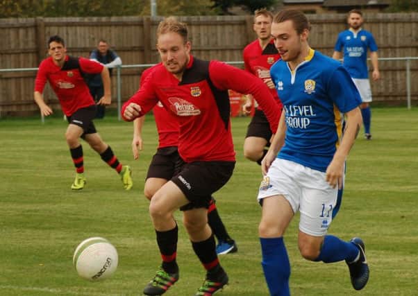 Ben Lapworth battles for possession as Town dominate the first half EMN-170927-113721002