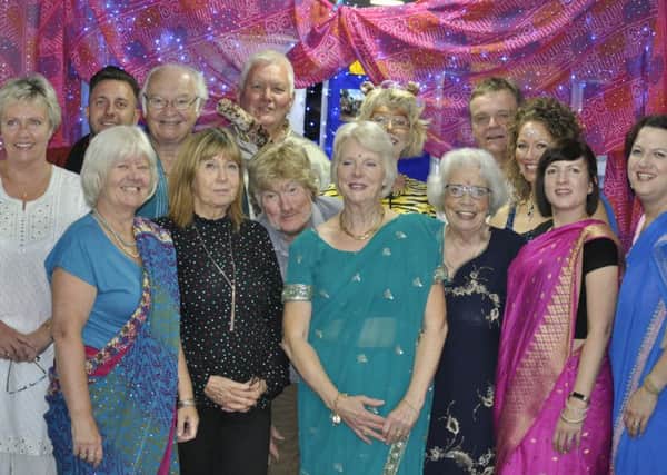 Aurora Rotarians in colourful Indian dress PHOTO: Supplied