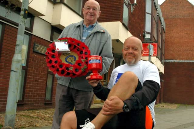 Richard Norton, who is running back-to-back marathons to raise money for the Remembrance Day parade in Melton, with the town's Poppy Appeal organiser Jock Bryson EMN-170910-152317001