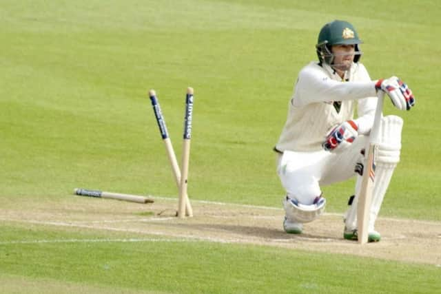 Nathan Lyon has his stumps flattened at Trent Bridge by Mark Wood as England regain the Ashes in 2015 EMN-170910-120633002