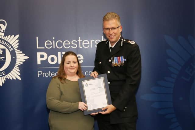 Carla Fox is receives a 'the chief constables commendation for outstanding work' from Leicestershire Chief Constable Simon Cole EMN-171013-122231001