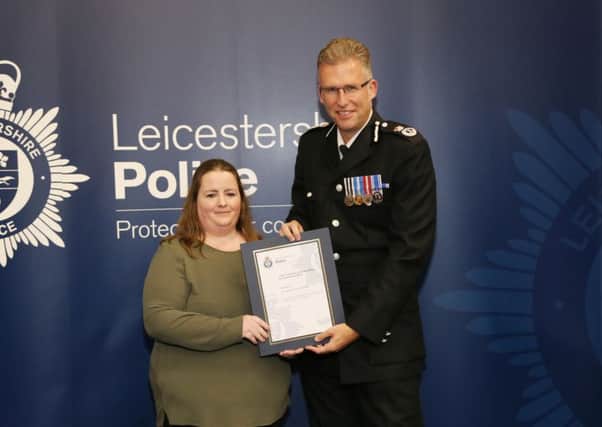Carla Fox is receives a 'the chief constables commendation for outstanding work' from Leicestershire Chief Constable Simon Cole EMN-171013-122231001