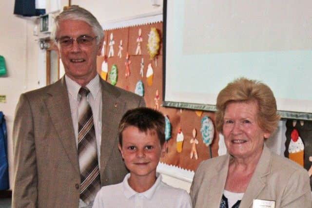 Kyle Liddington of Swallowdale Primary School receives his Rotary Star Award from Rotarians Penny Hancox and Eric Hall PHOTO: Supplied