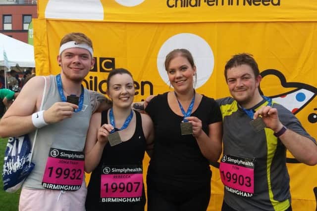 At the finish with their medals - (Left to right): Jon Baines, Rebecca Baines, Laura Bedson and Tom Baines PHOTO: Supplied