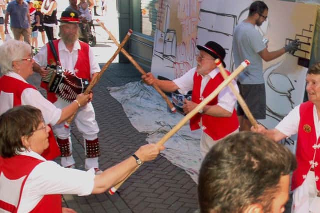 New Saint George Morris dancers performing at Paint the town Red PHOTO: Tim Williams