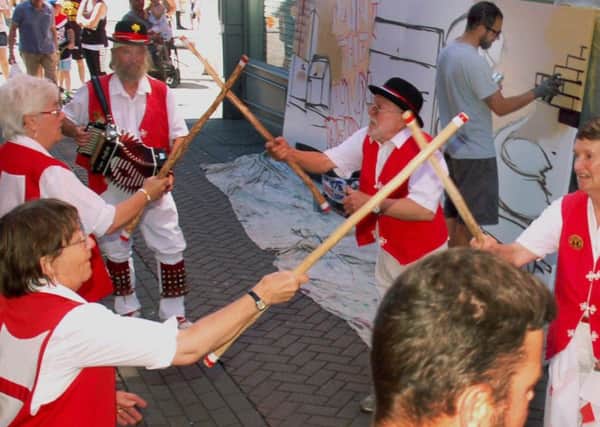 New Saint George Morris dancers performing at Paint the town Red PHOTO: Tim Williams