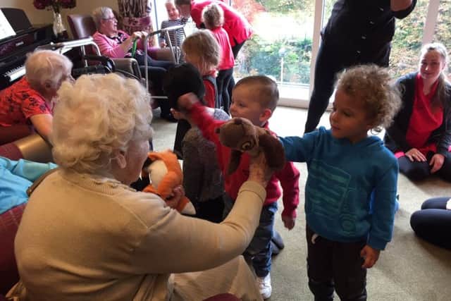 Tots and their elders play games and laugh with one another PHOTO: Supplied