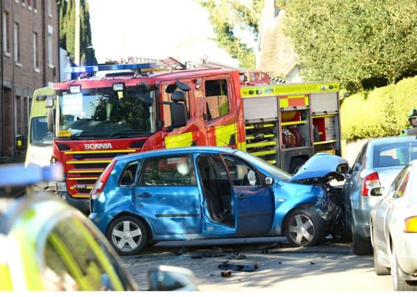 LH2230-05 : Â©Lionel Heap : The scene of a road collision in Thrussington village centre EMN-171027-145956001