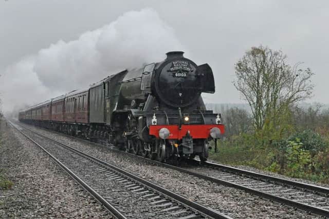 The Flying Scotsman stopped at Melton Railway Station to pick up passengers on its third visit to the town this year. The restored historic steam train is shown travelling between Whissendine and Wyfordby.
PHOTO PAUL DAVIES EMN-170611-144732001