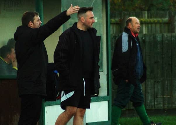 Holwell manager John Webster (centre) with his predecessor Simon Daws (right) who returned to Welby Road with a young Radcliffe side EMN-170711-090145002