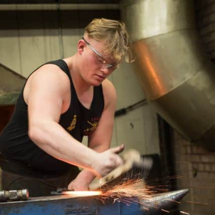 Gnr O'Neill, a competitor in the annual British Army Shoeing Competition held at the Army School of Farriery, Melton Mowbray.
Image by LCpl Weideman; UK Ministry of Defence ? Crown copyright 2017 EMN-170811-141137001