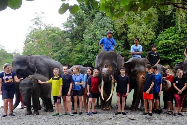 Long Field Academy students at the Elephant conservation project during their trip to Sumatra EMN-171011-102356001