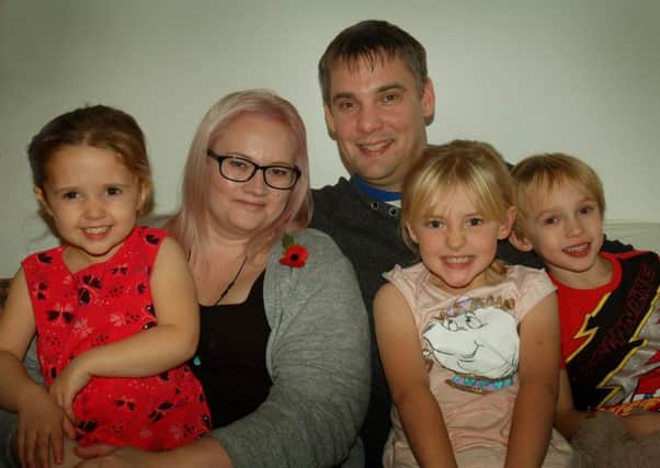 Chris and Caroline Platts with their children Ruby, Harry and Phoebe. The family are benefiting from the Poppy Appeal fund following Caroline's illness. EMN-171113-102311001