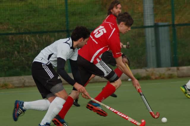 Jamie Smith in action as Melton HC Second XI maintained their 100 per cent home record this season with a 2-1 win against Chesterfield EMN-171114-092702002