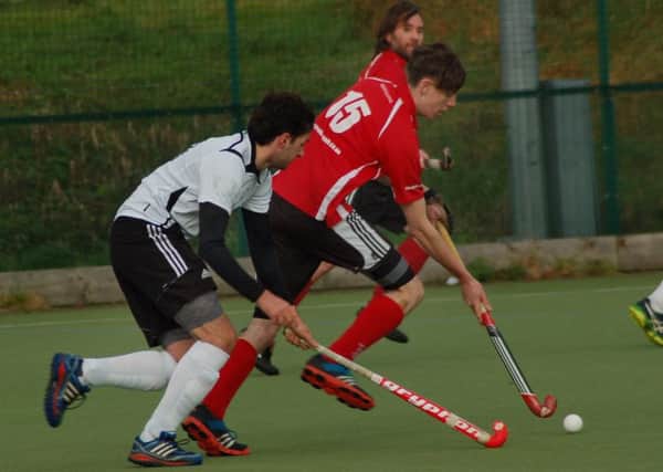 Jamie Smith in action as Melton HC Second XI maintained their 100 per cent home record this season with a 2-1 win against Chesterfield EMN-171114-092702002