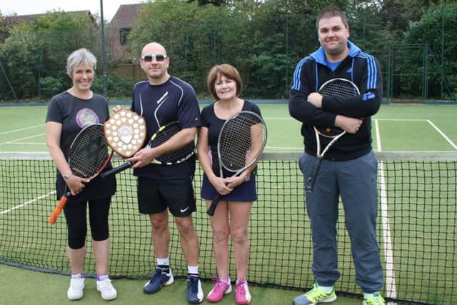 Mixed dohbles winners Sue Corfield and Jimmi Cox (left) with finalists Margaret Heggs and Mike Crane EMN-171114-100152002