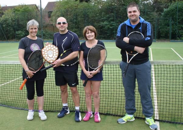 Mixed dohbles winners Sue Corfield and Jimmi Cox (left) with finalists Margaret Heggs and Mike Crane EMN-171114-100152002